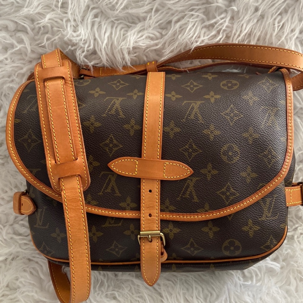 L V Saumur bag 100% Authentic